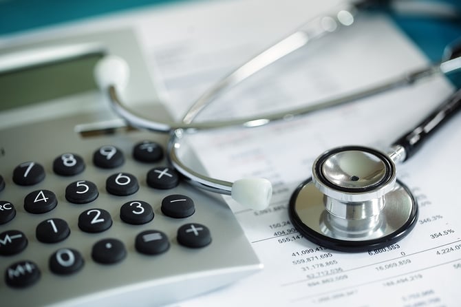 initial assessment in business plan bigstock-Calculator-and-stethoscope-on-80468285