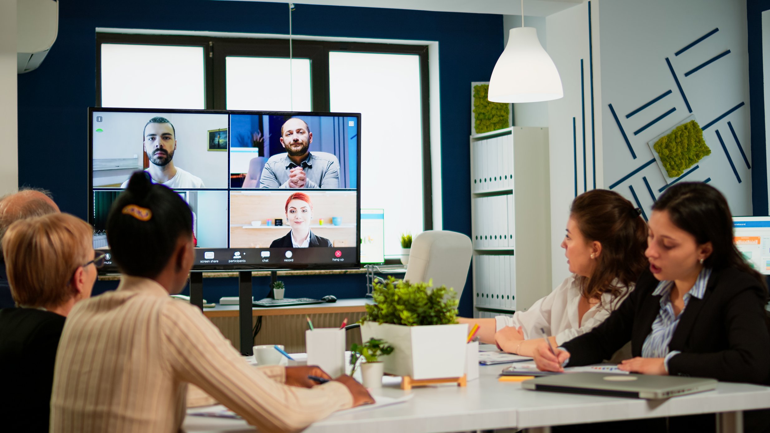 bigstock-Emplyees-Workers-Having-Webcam-409635745