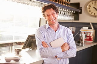 bigstock-Male-restaurant-owner-holding--94341125.jpg
