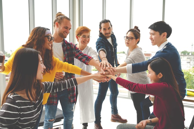 bigstock-Multiethnic-Young-Team-Stack-H-248542234 (1)