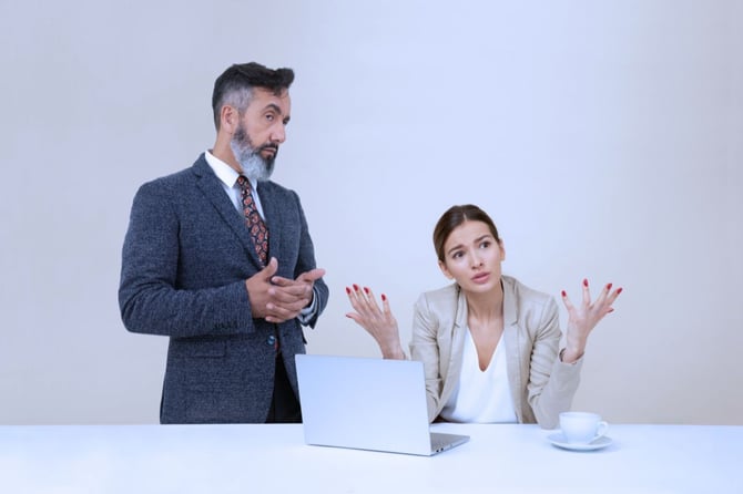 employee and manager in the middle of a frustrating conversation