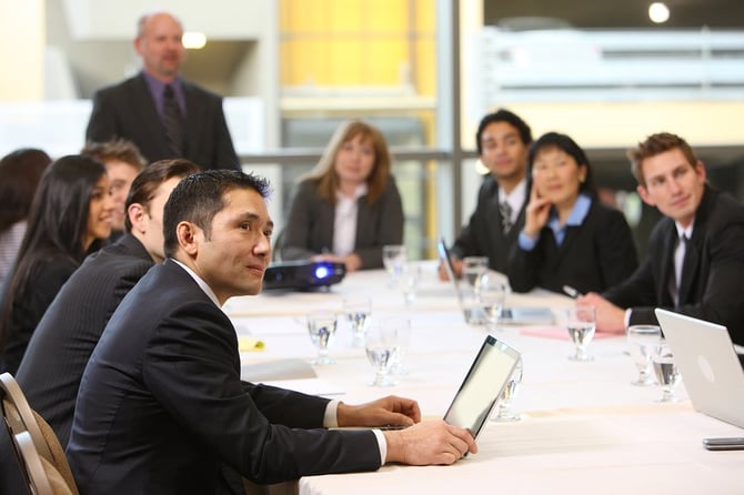 bigstock-Business-people-in-board-room-14088314-1